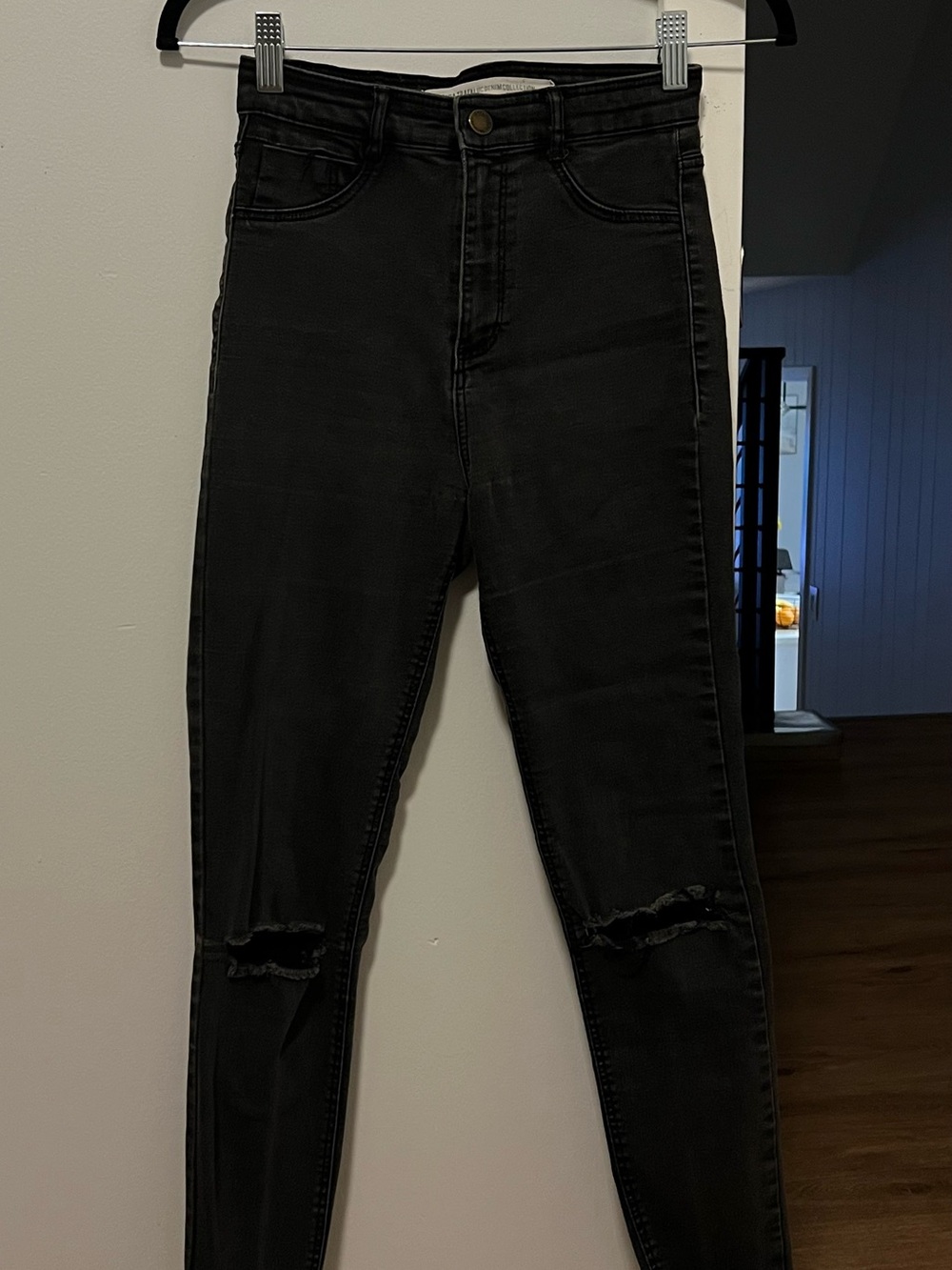 High-Waisted Black Skinny Jeans with Knee Rips